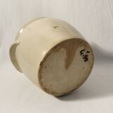 Beige glazed stoneware pot with handle