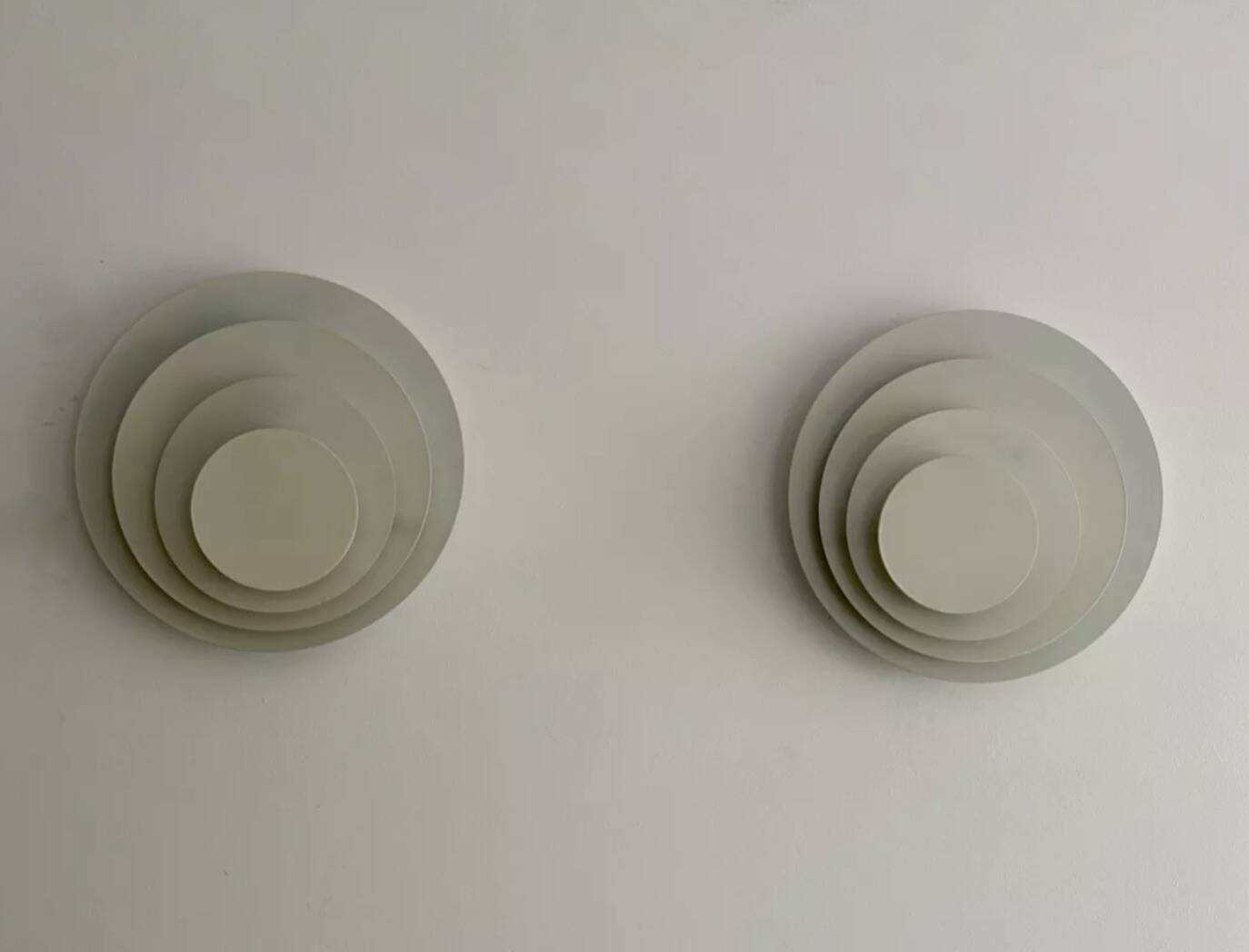 Pair of vintage geometric wall lights, white lacquered metal, Germany 1980s