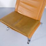 Imposante paire de fauteuils cuir et acier années 60'