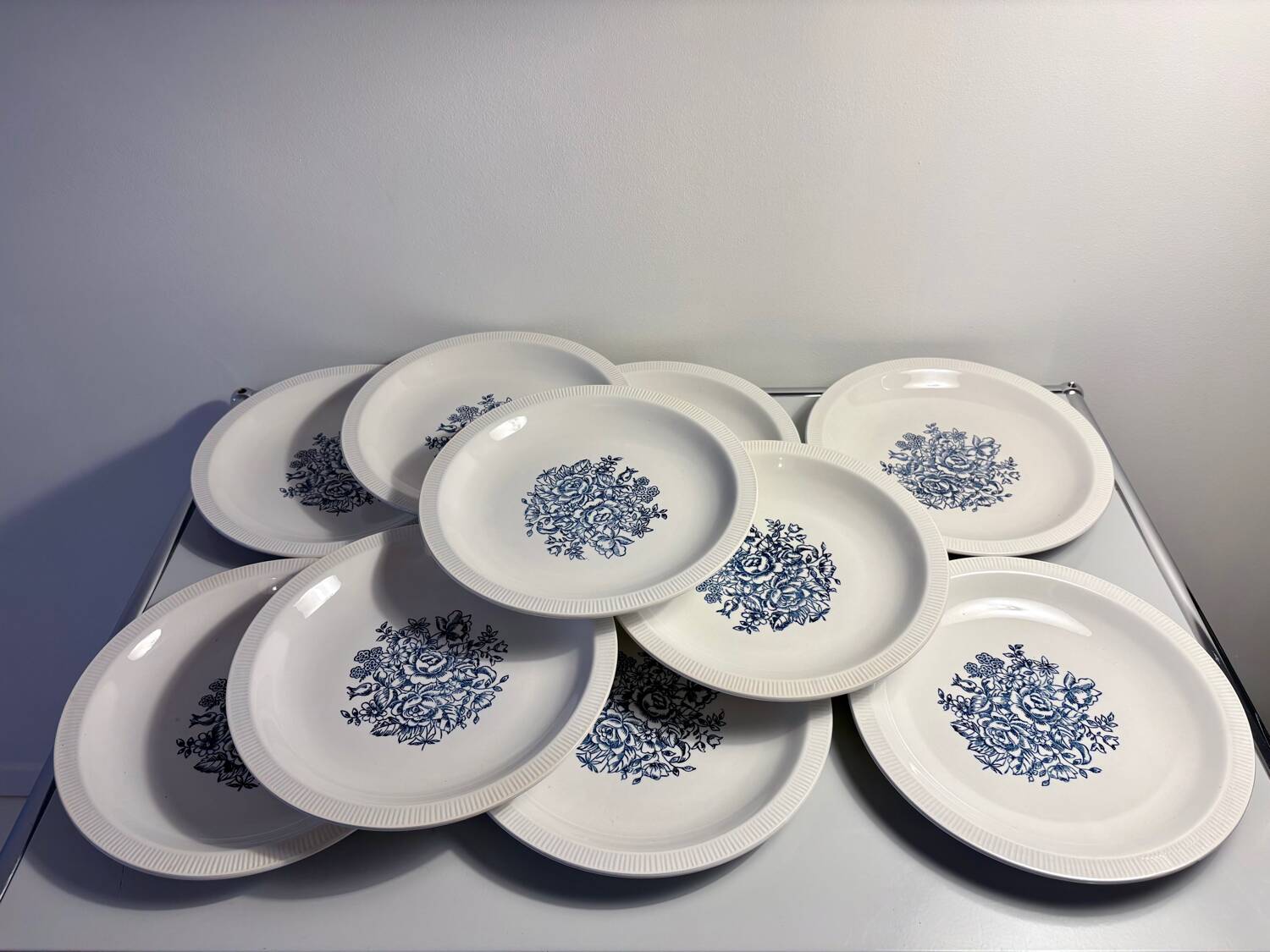 Set of 10 antique Lunéville flat plates – blue floral decoration