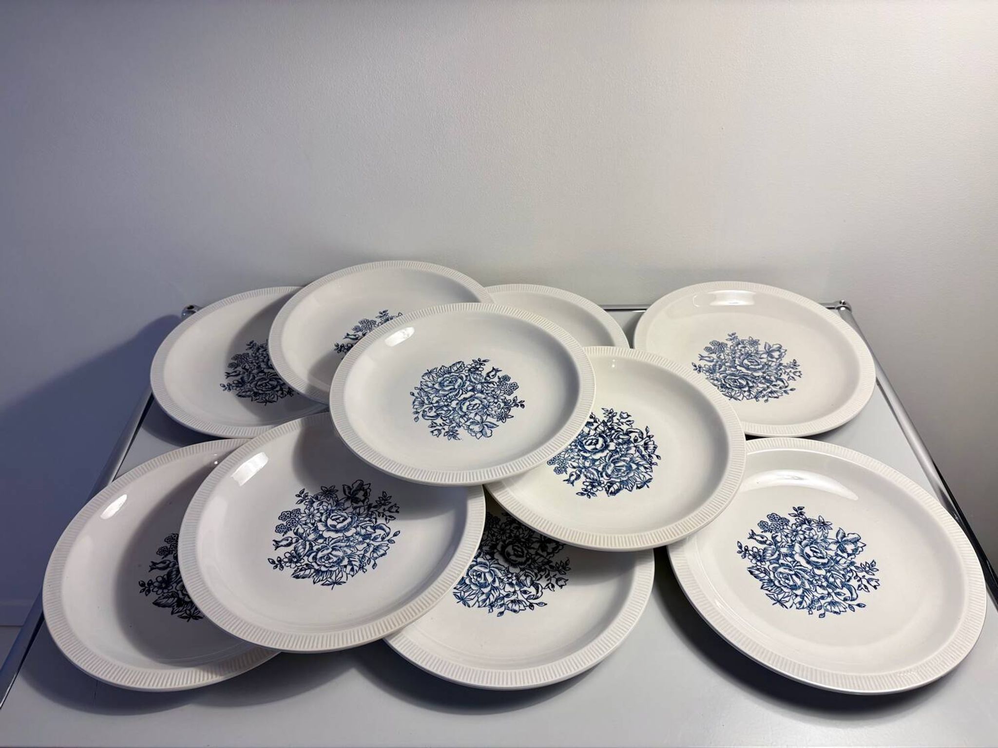 Set of 10 antique Lunéville flat plates – blue floral decoration
