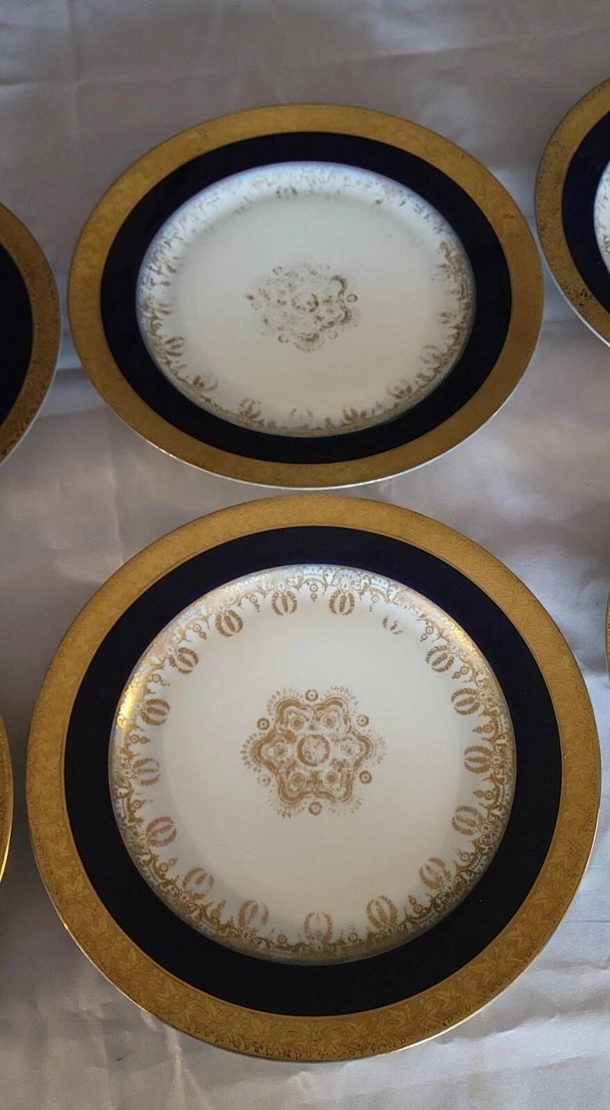 J. Pouyat Limoges: set of 10 fine porcelain plates, decorated