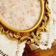 2 frames in gilded metal and curved glass