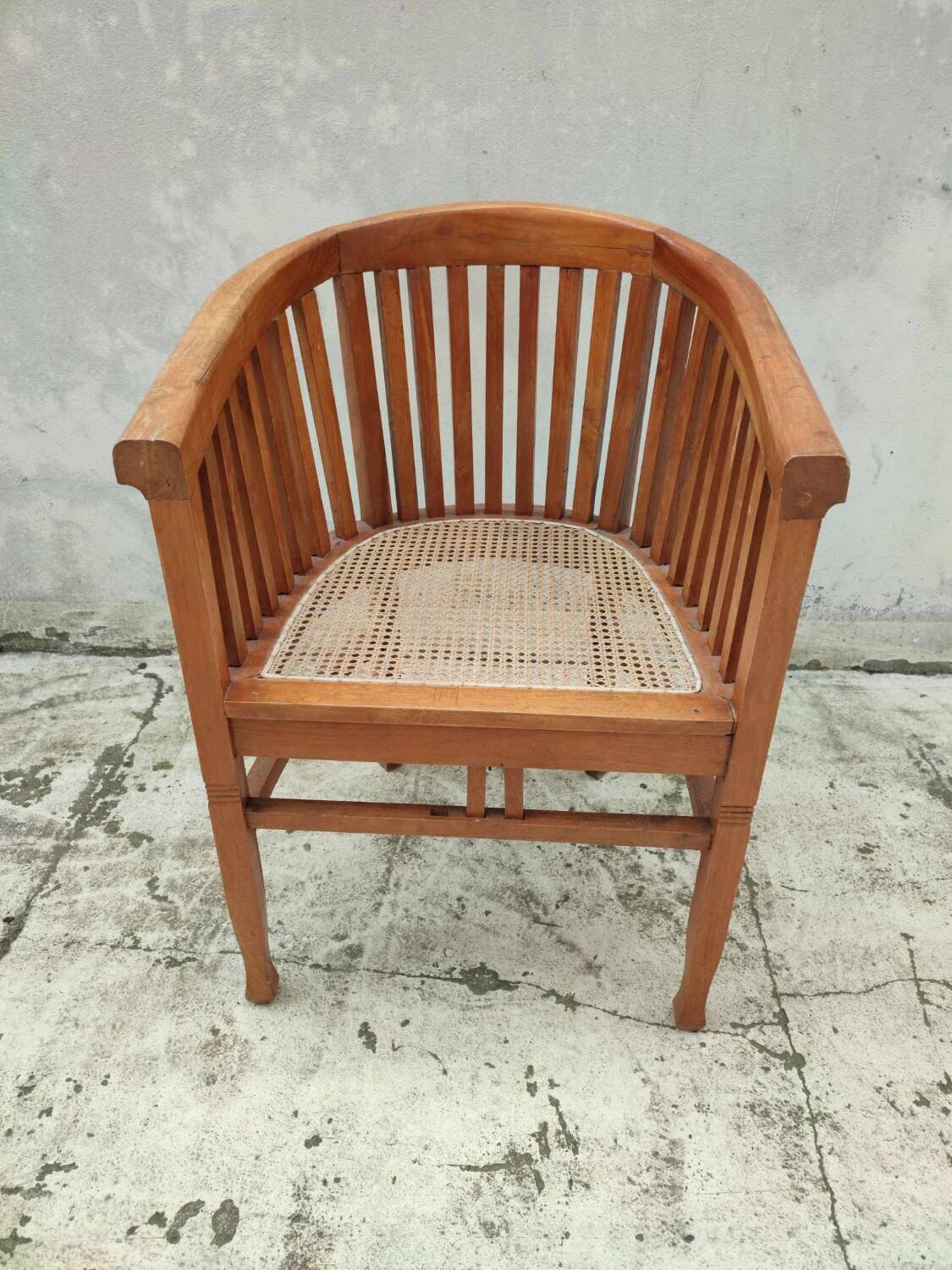 Old vintage teak wood cane armchair
