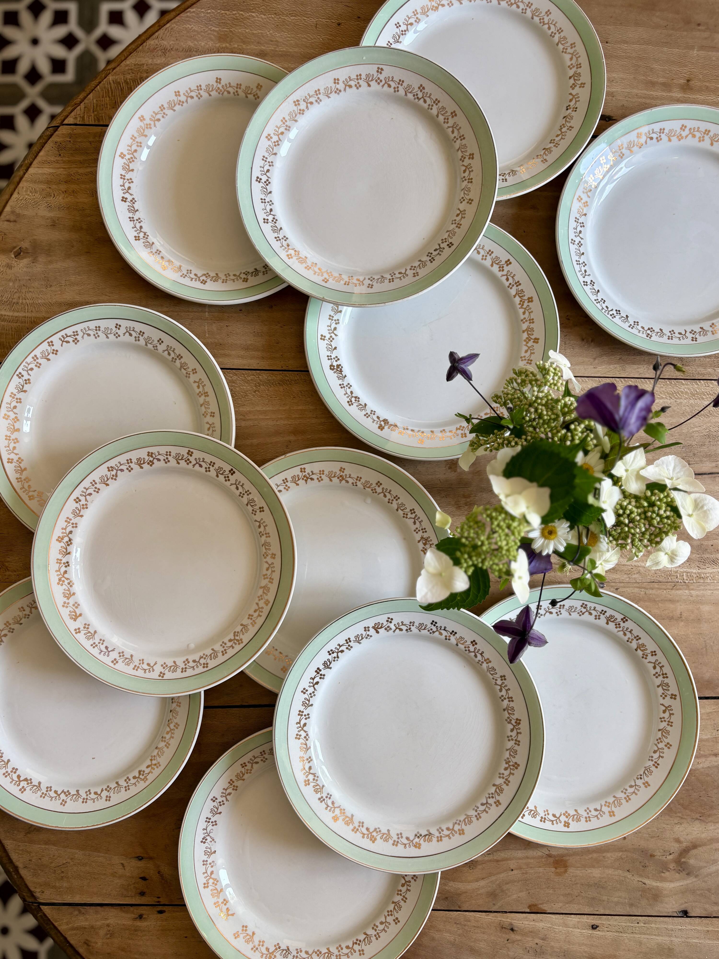 Set of 12 white, mint and gold flat plates, Mosèle de Lunéville
