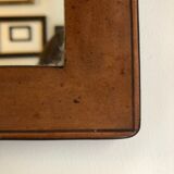 Early 20th century mirror in patinated leather  21x33,5cm