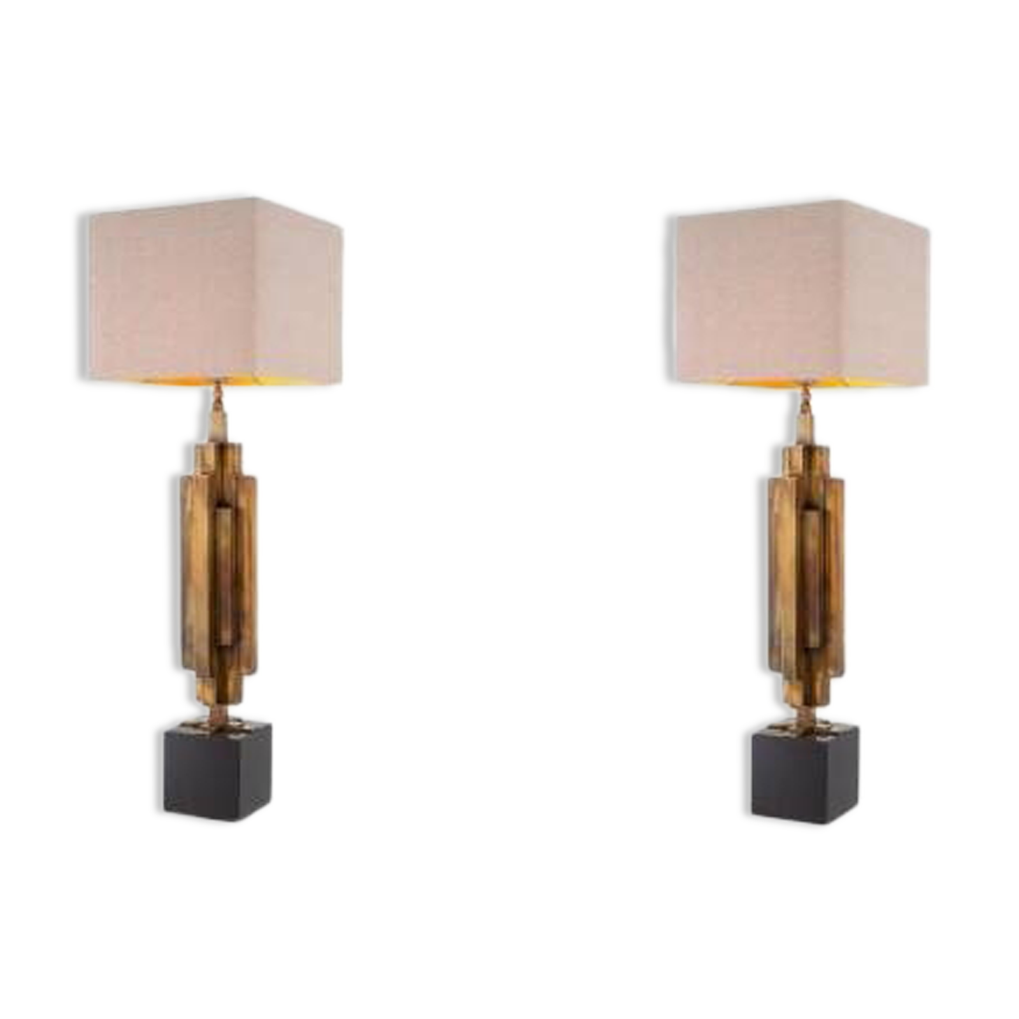 Pair of patinated brass table lamps, granite base, artistic design