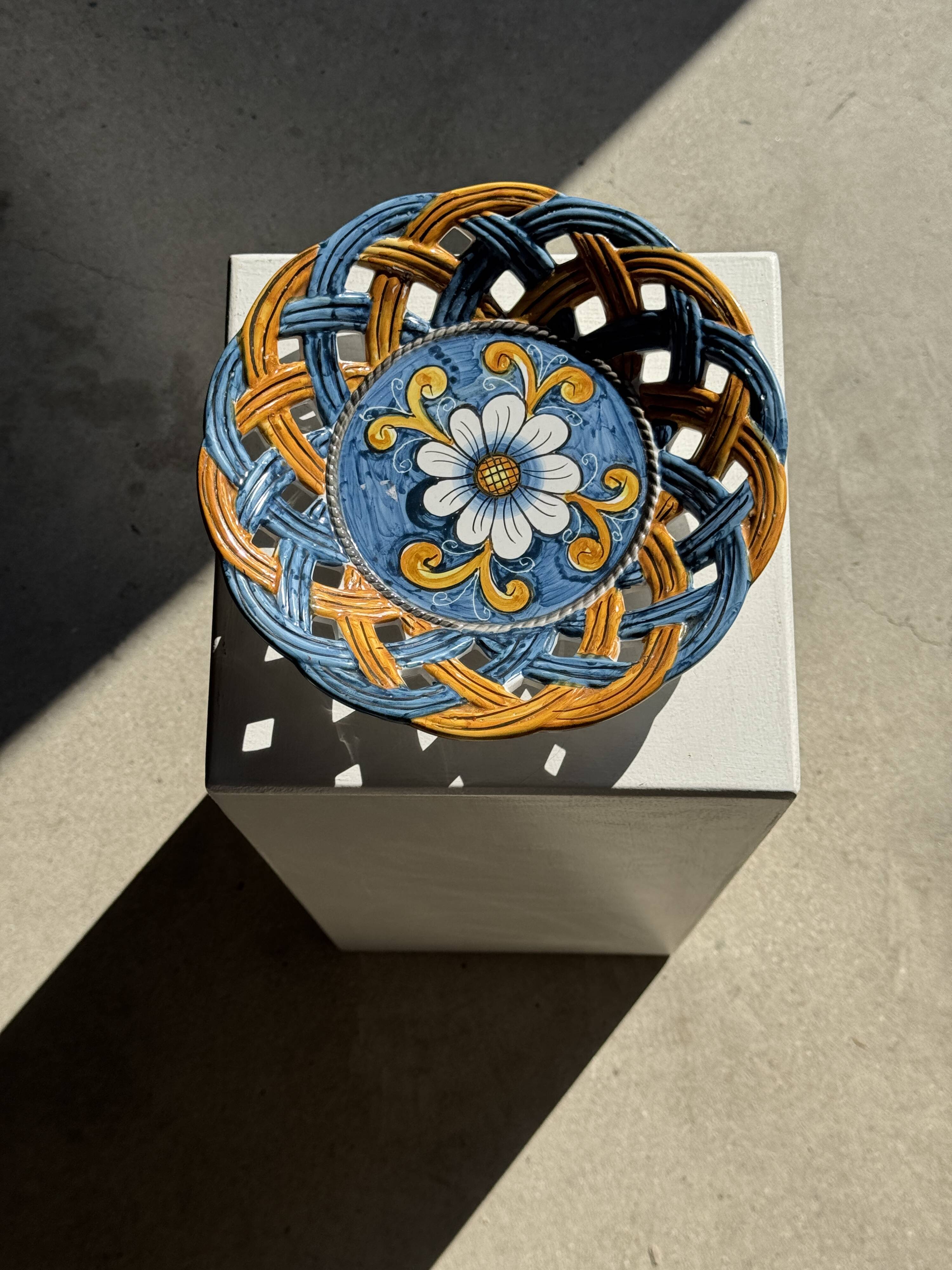 Glazed ceramic fruit bowl by Brancaleone, Italy, with floral decoration.