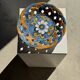 Glazed ceramic fruit bowl by Brancaleone, Italy, with floral decoration.