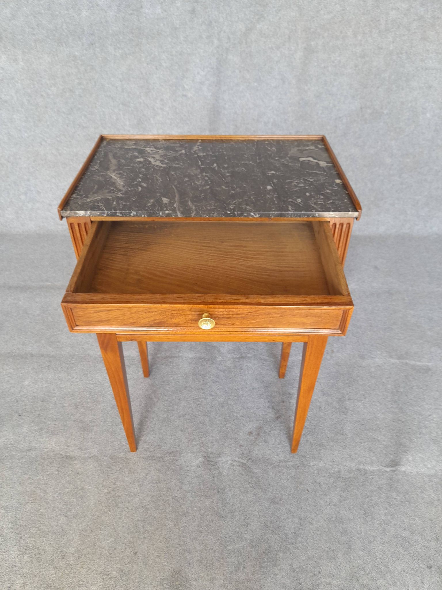 Louis XVI flying table from the early 19th century.