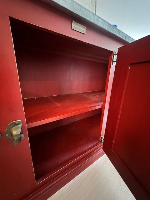 Low red "Guérande" buffet, zinc top, butcher's fridge-style doors