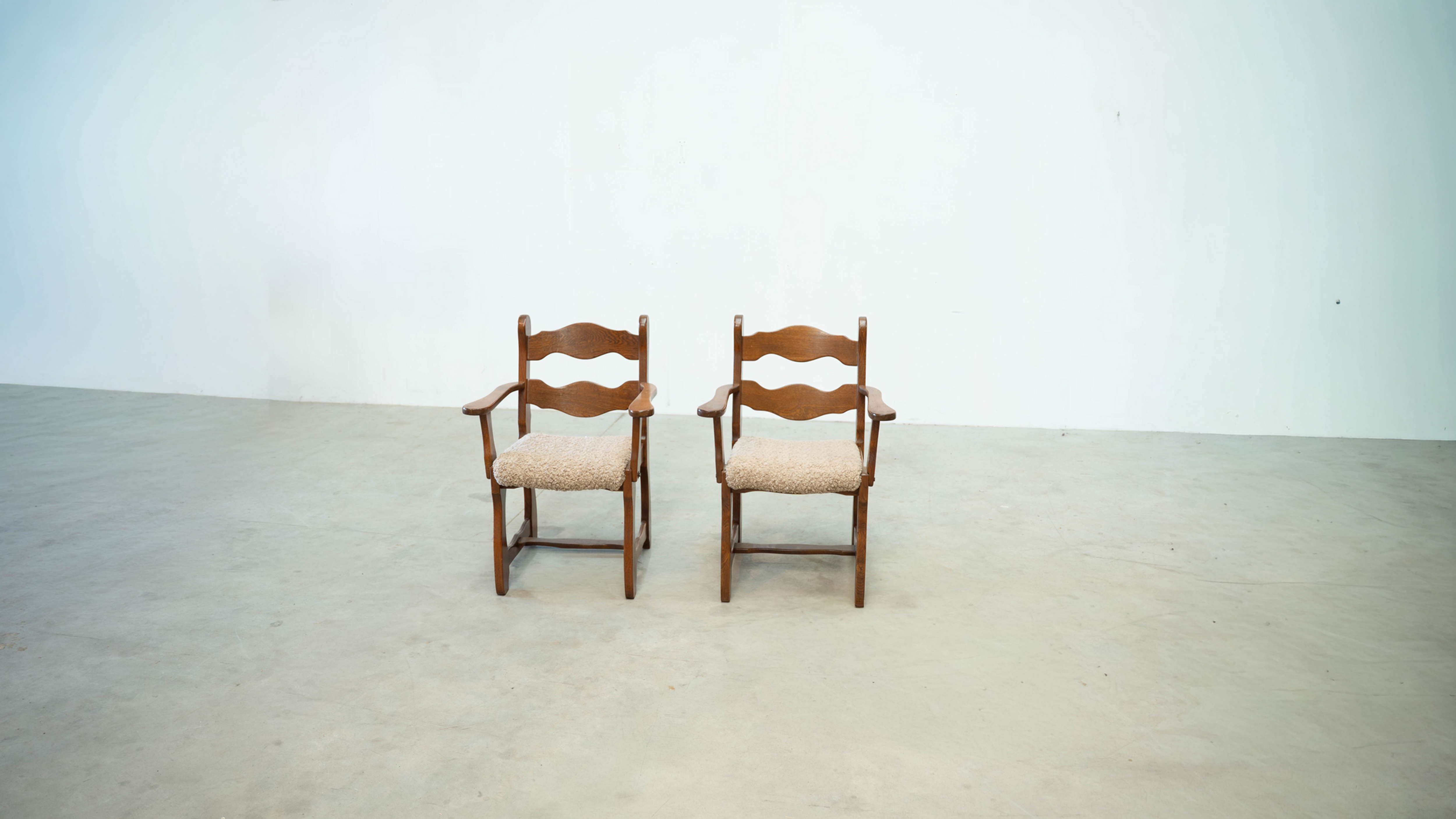 Set of two razorback armchairs