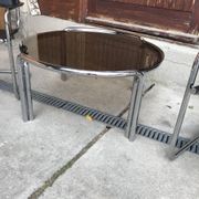 Mid-Century tubular coffee table with grey smoked glass and chrome metal, 1960s design.