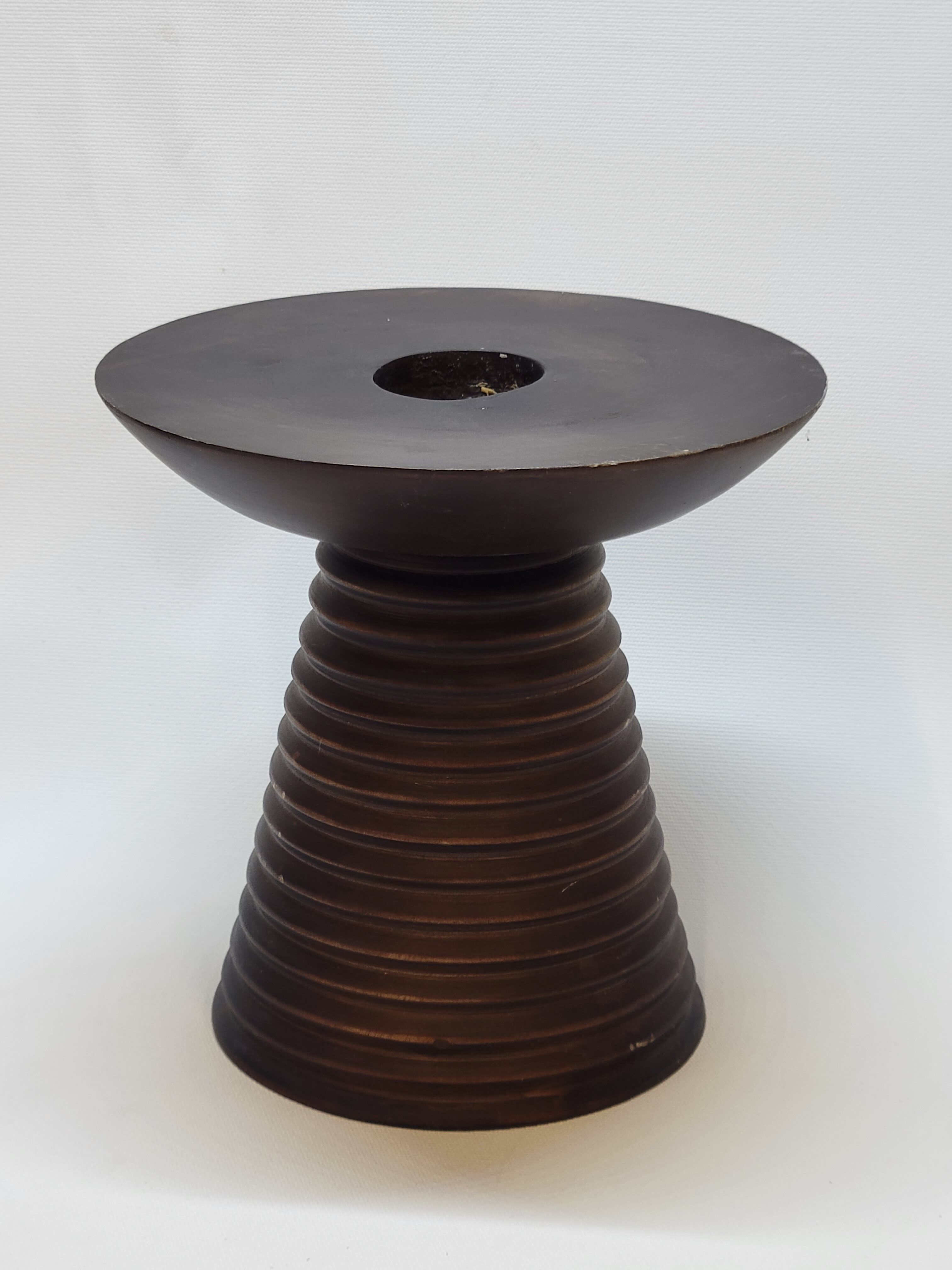 Scandinavian wooden candle holder turned sleek design