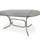 Silver metal table with smoked glass top from the 1970s.