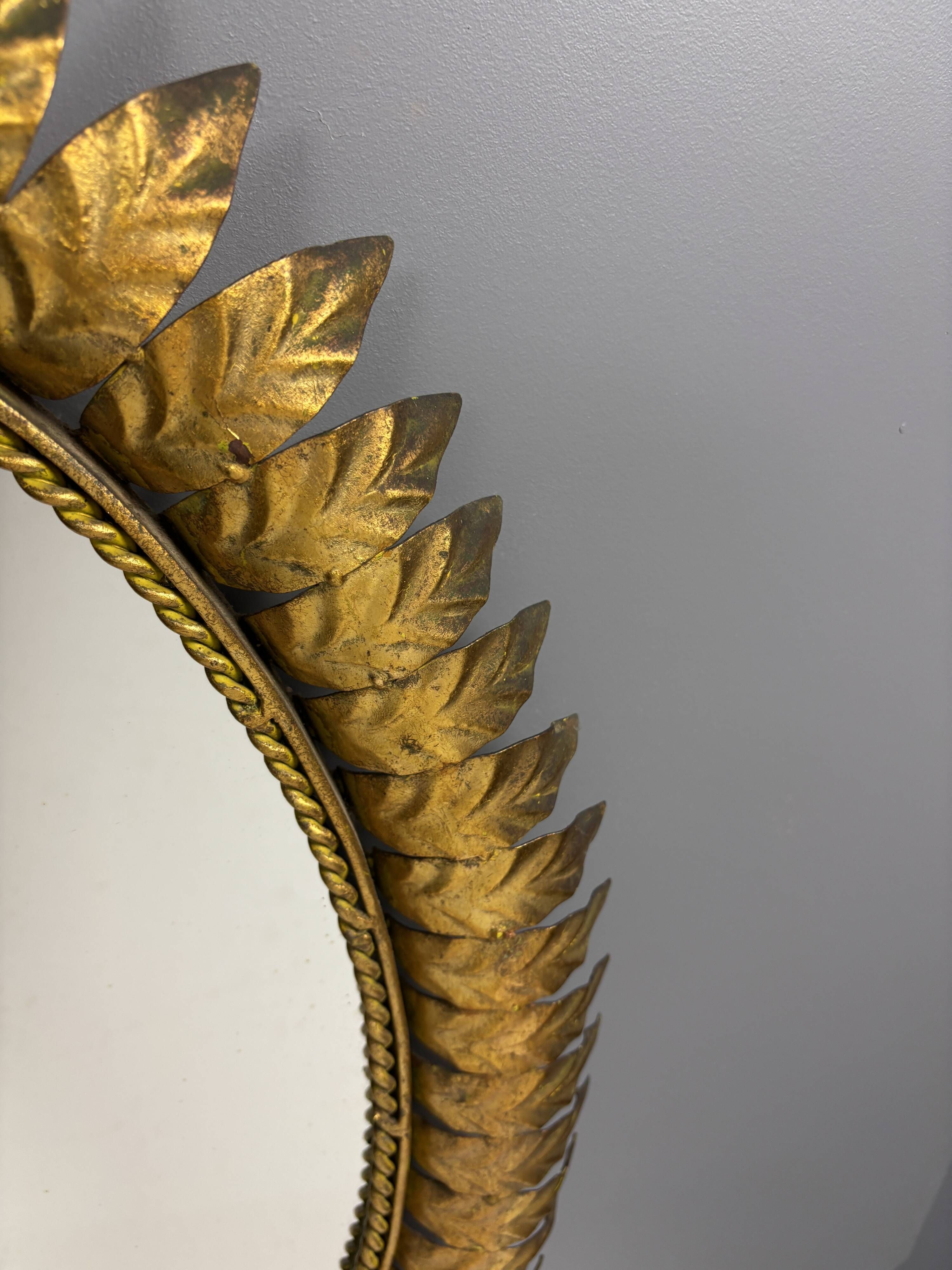 Midcentury bohemian hollywood regency spanish gilt metal sun mirror, 1960s