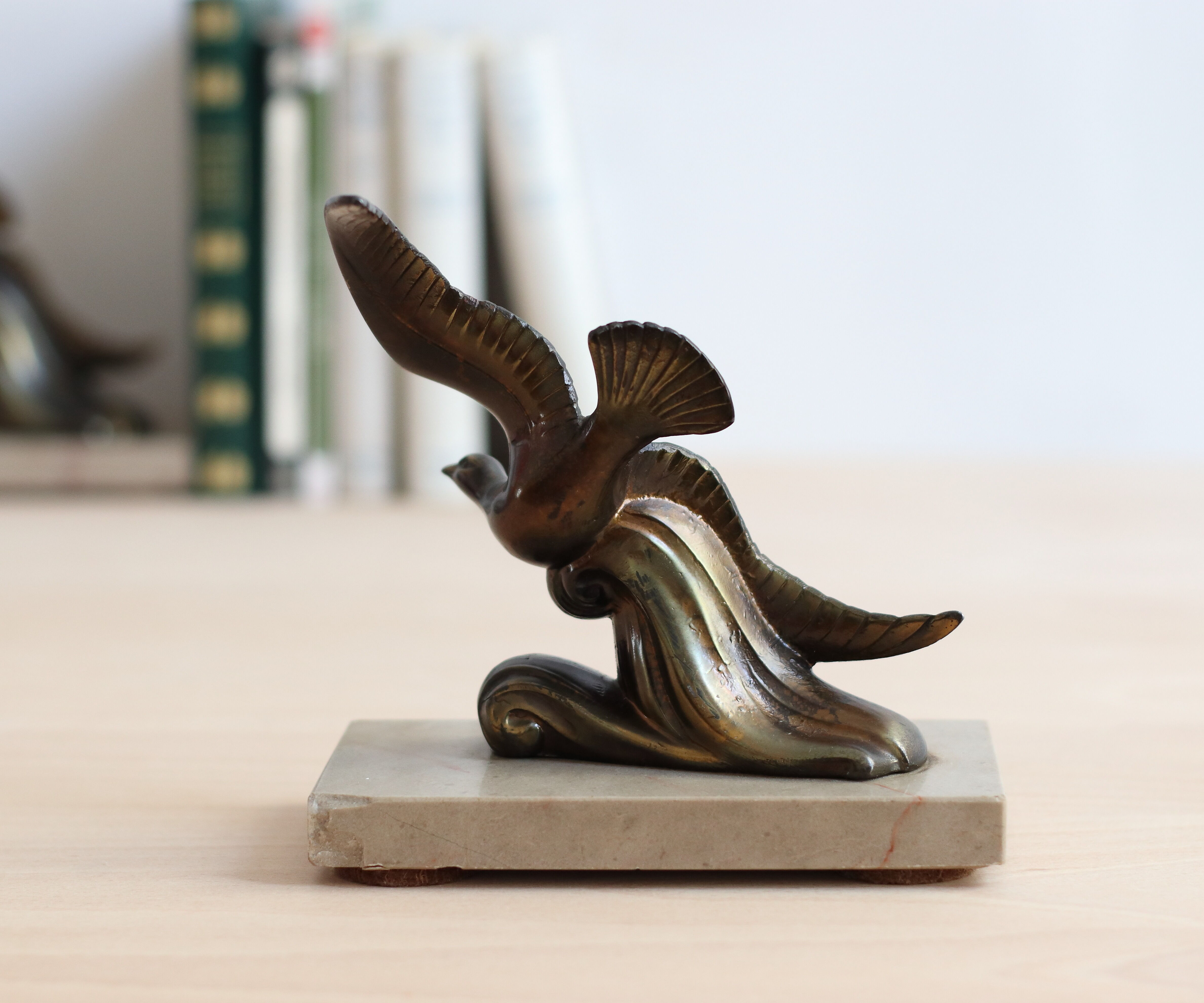 Pair of art deco seagull bookends in regulation and marble