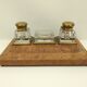 Old wooden office inkwell set and glass and brass accessories