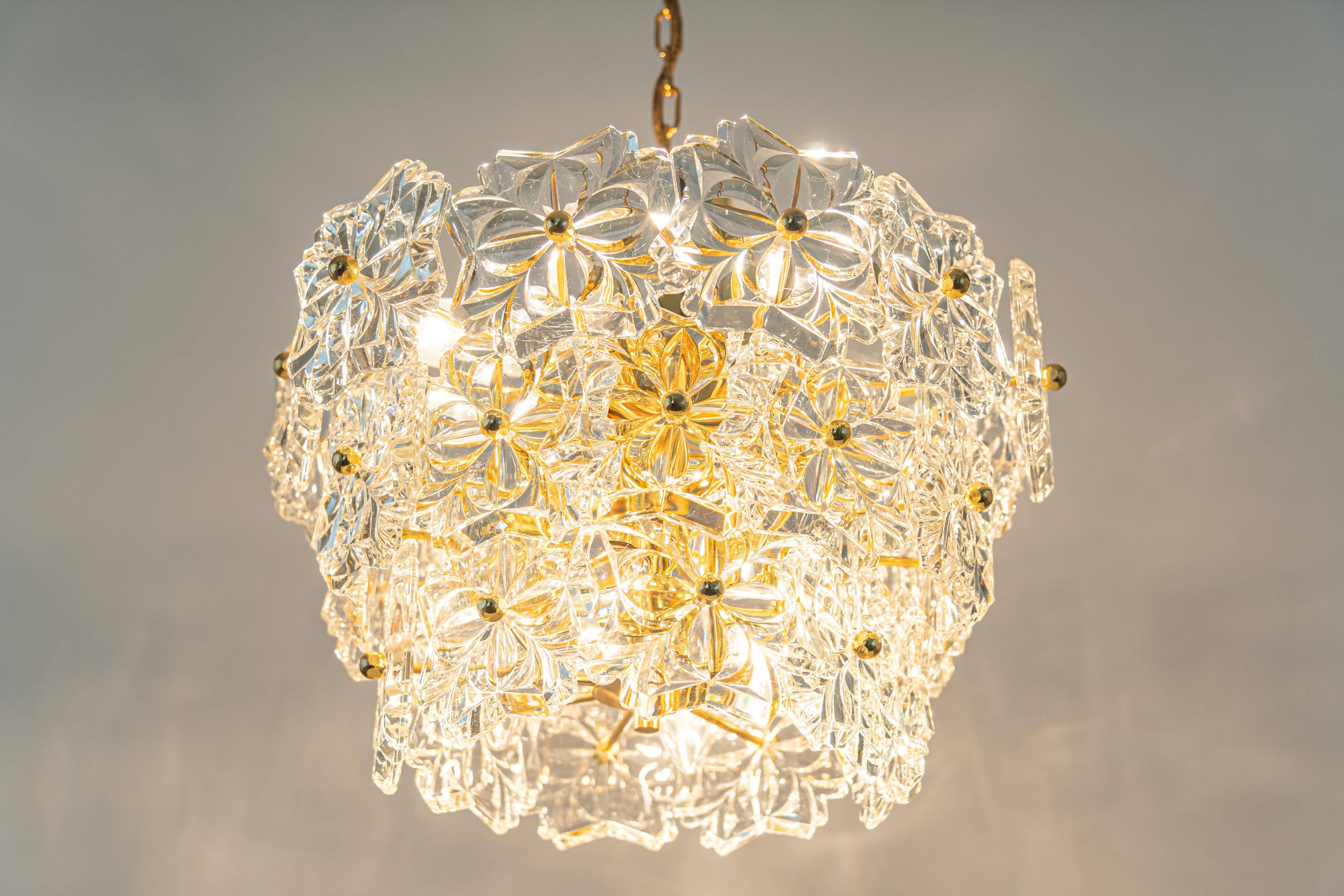 Chandelier in gilded brass and crystal glass, Germany, 1970s