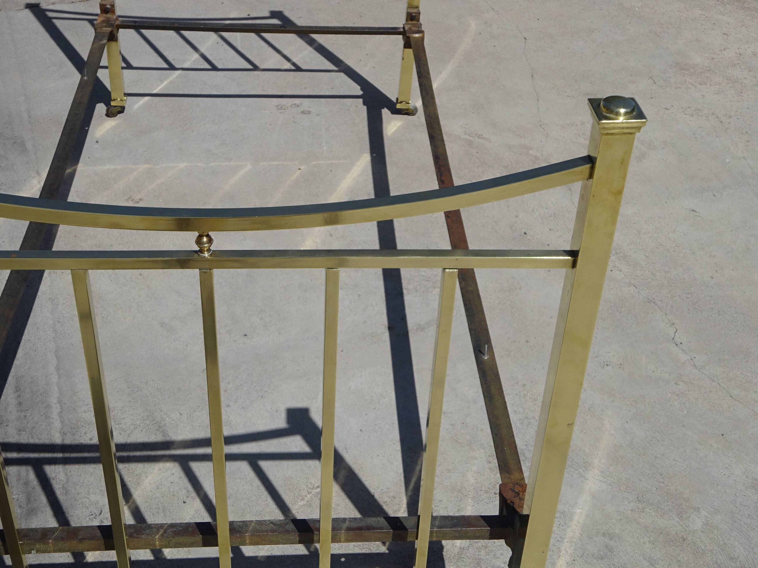 Antique gold-plated brass bed for one person.