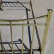 Antique gold-plated brass bed for one person.