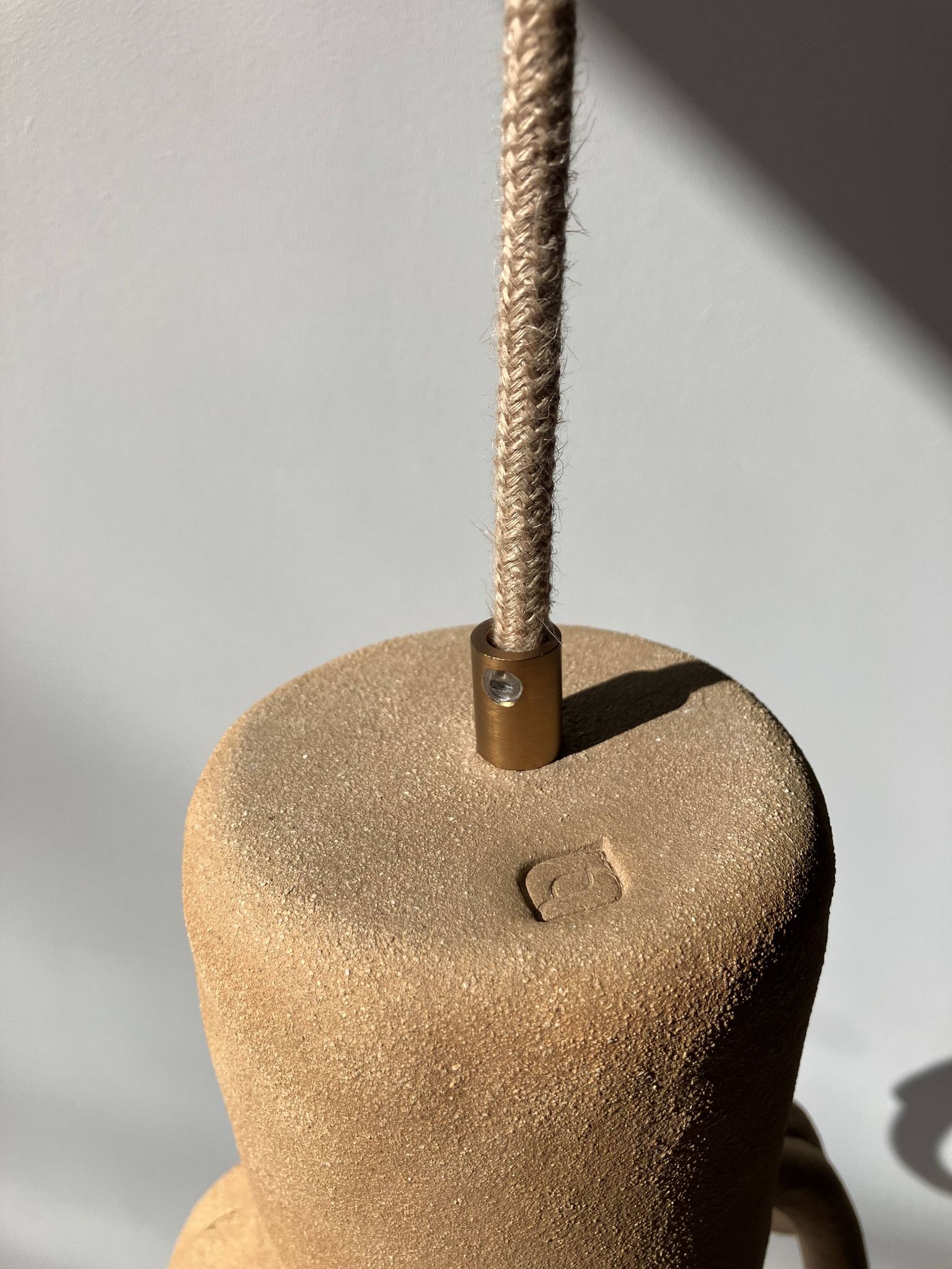 Suspension in the shape of a flower made of handcrafted ceramic, raw red stoneware mid-century.