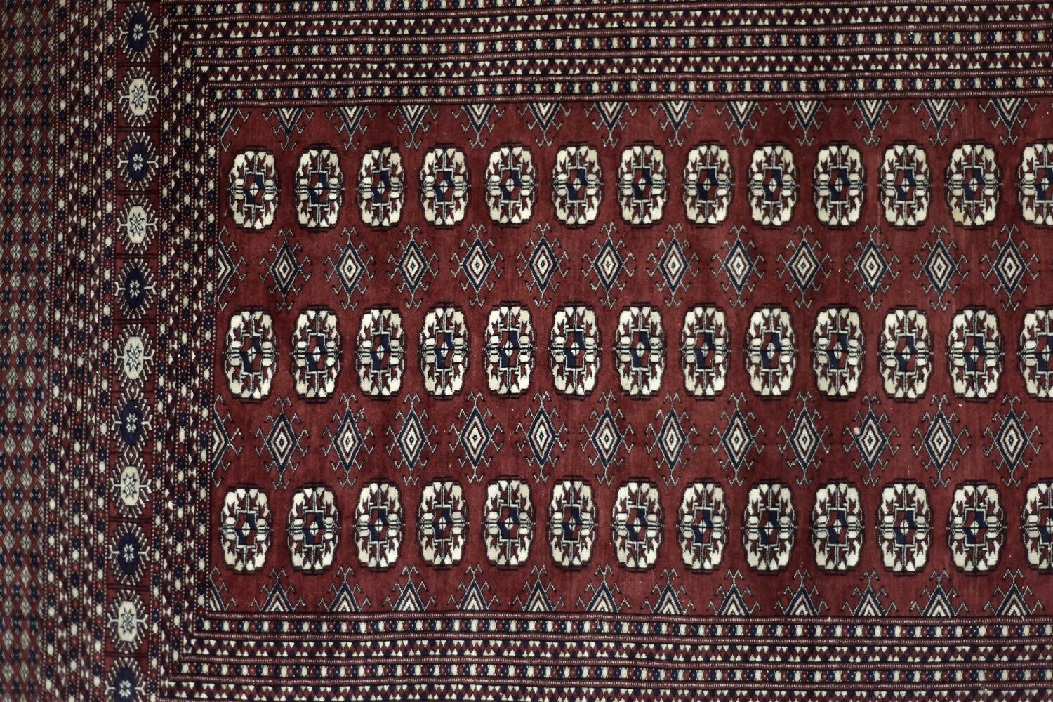 Handwoven red Boukhara oriental rug, 1960s