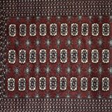 Handwoven red Boukhara oriental rug, 1960s