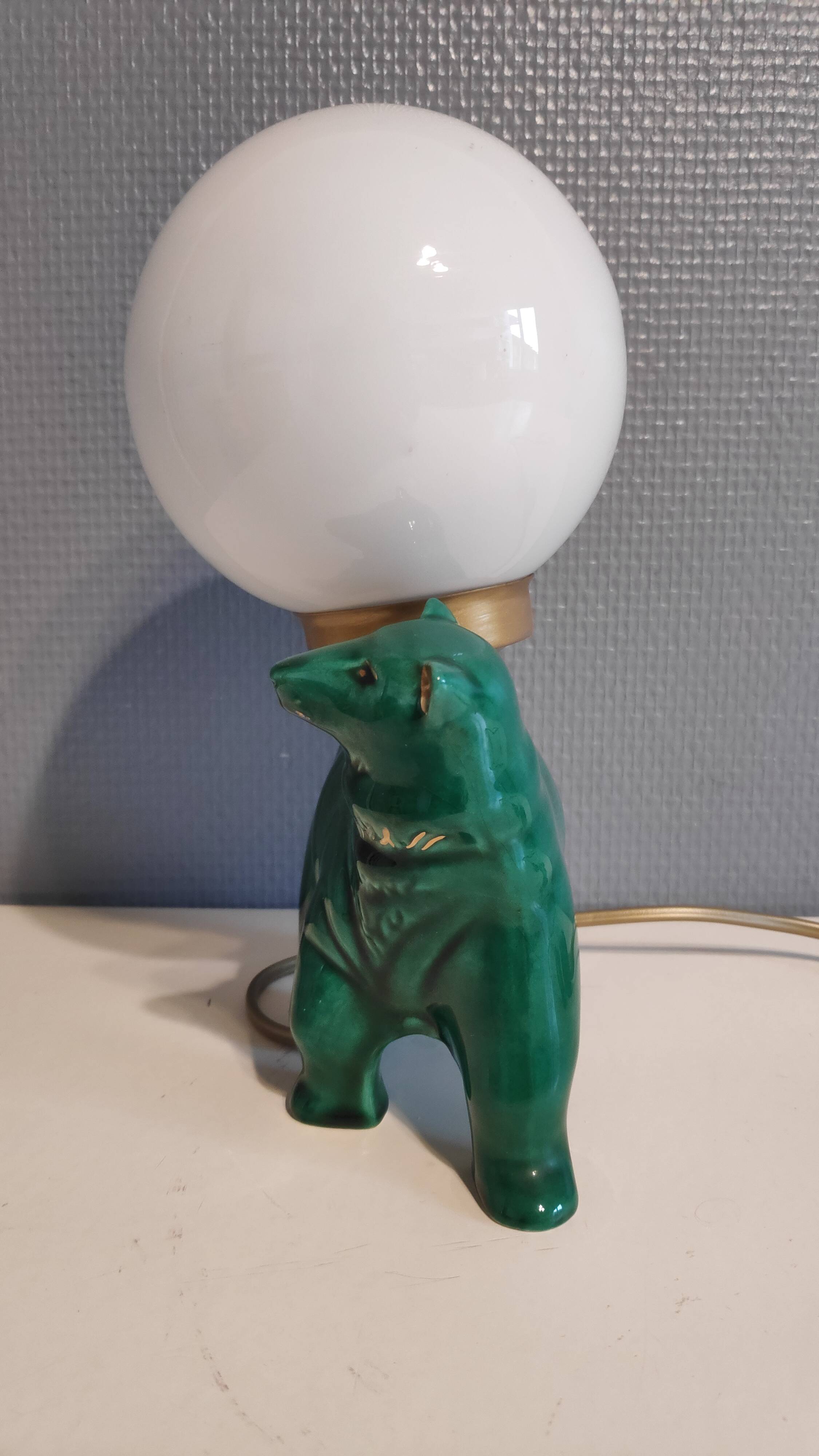 Green ceramic bear lamp and white opaline globe