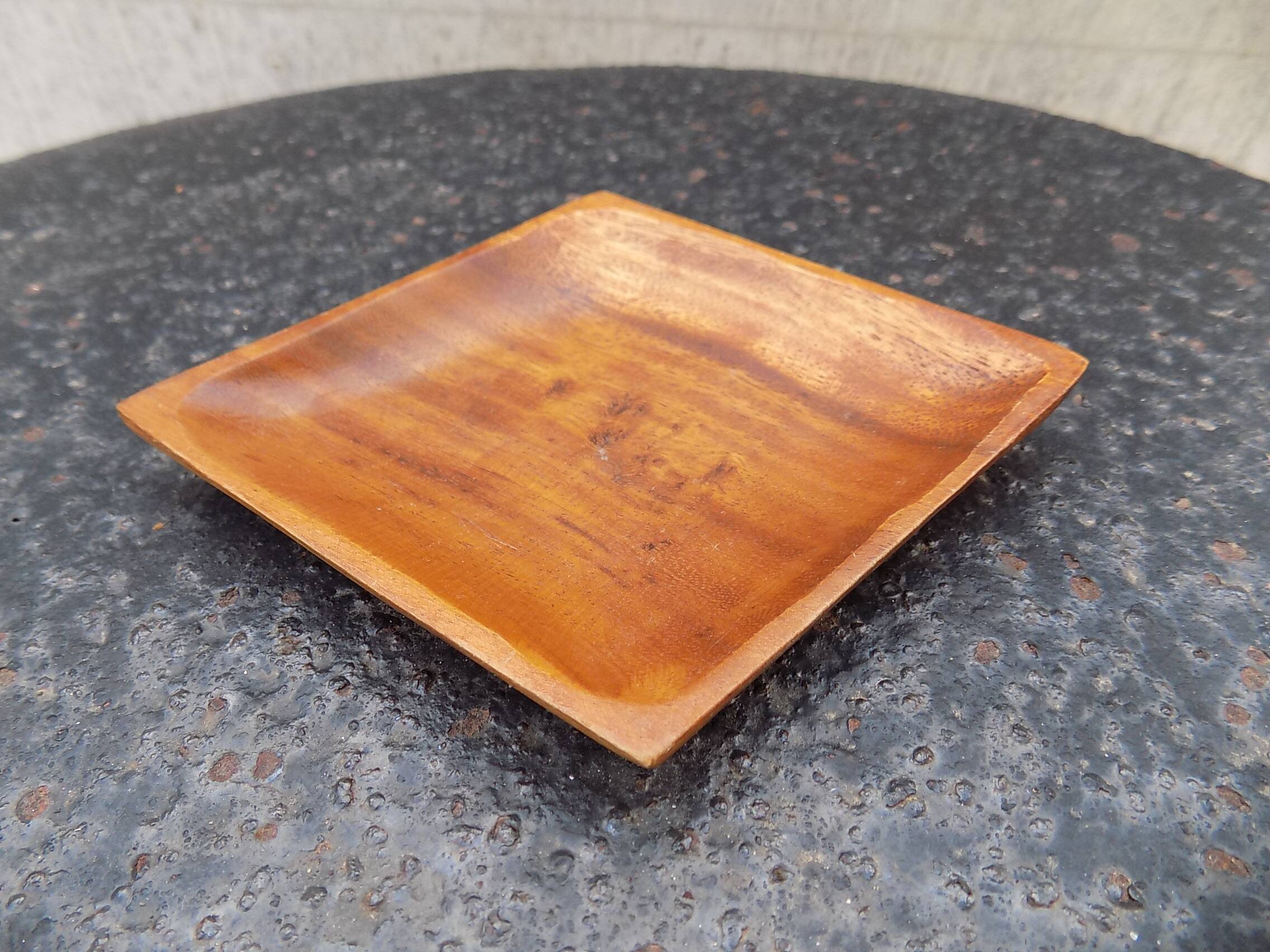 wooden pocket emptier