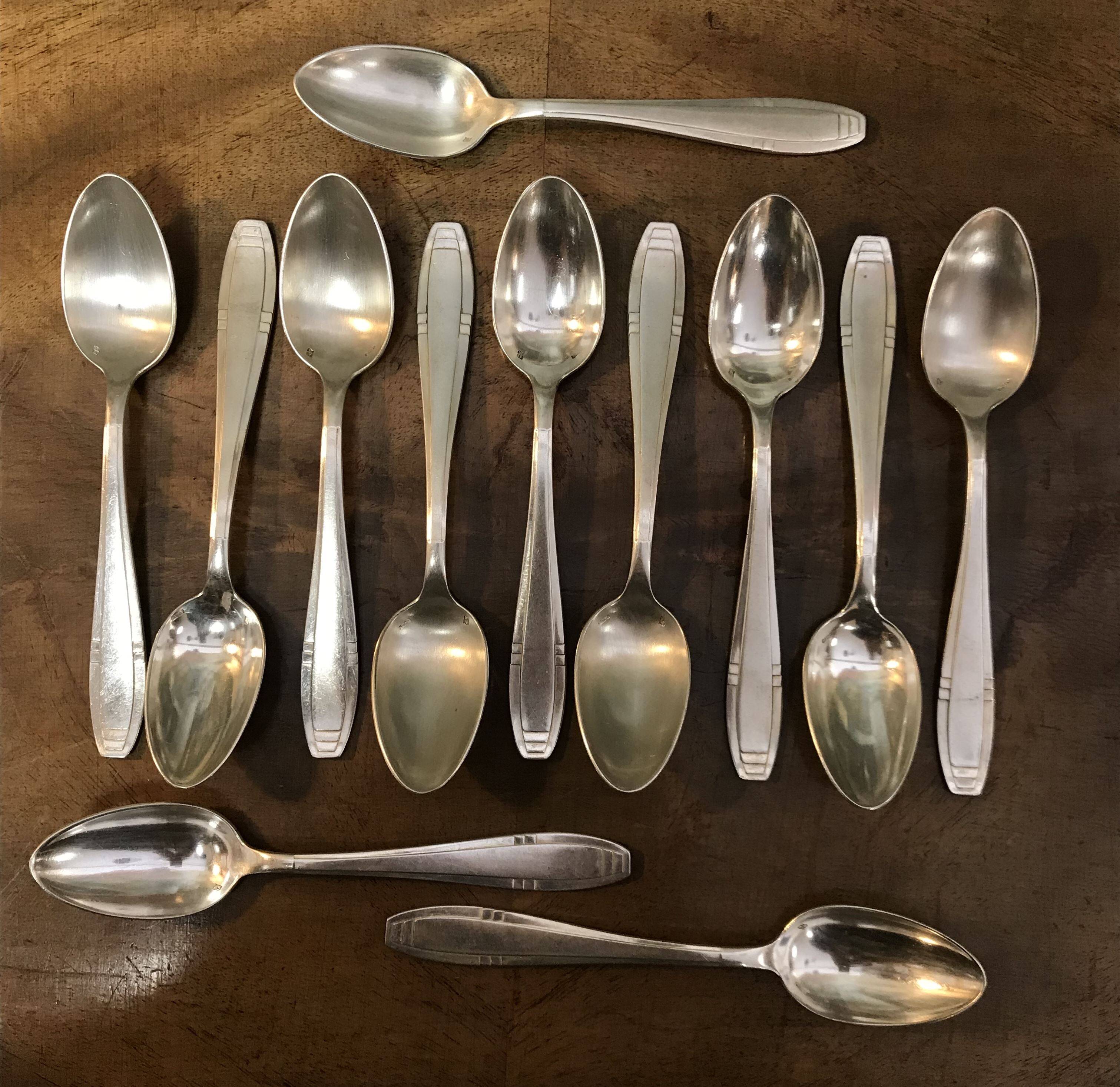 Set of 12 Apollo brand silver-plated metal teaspoons