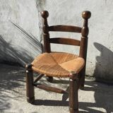 Straw low chair in the style of Charles Dudouyt