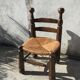 Straw low chair in the style of Charles Dudouyt