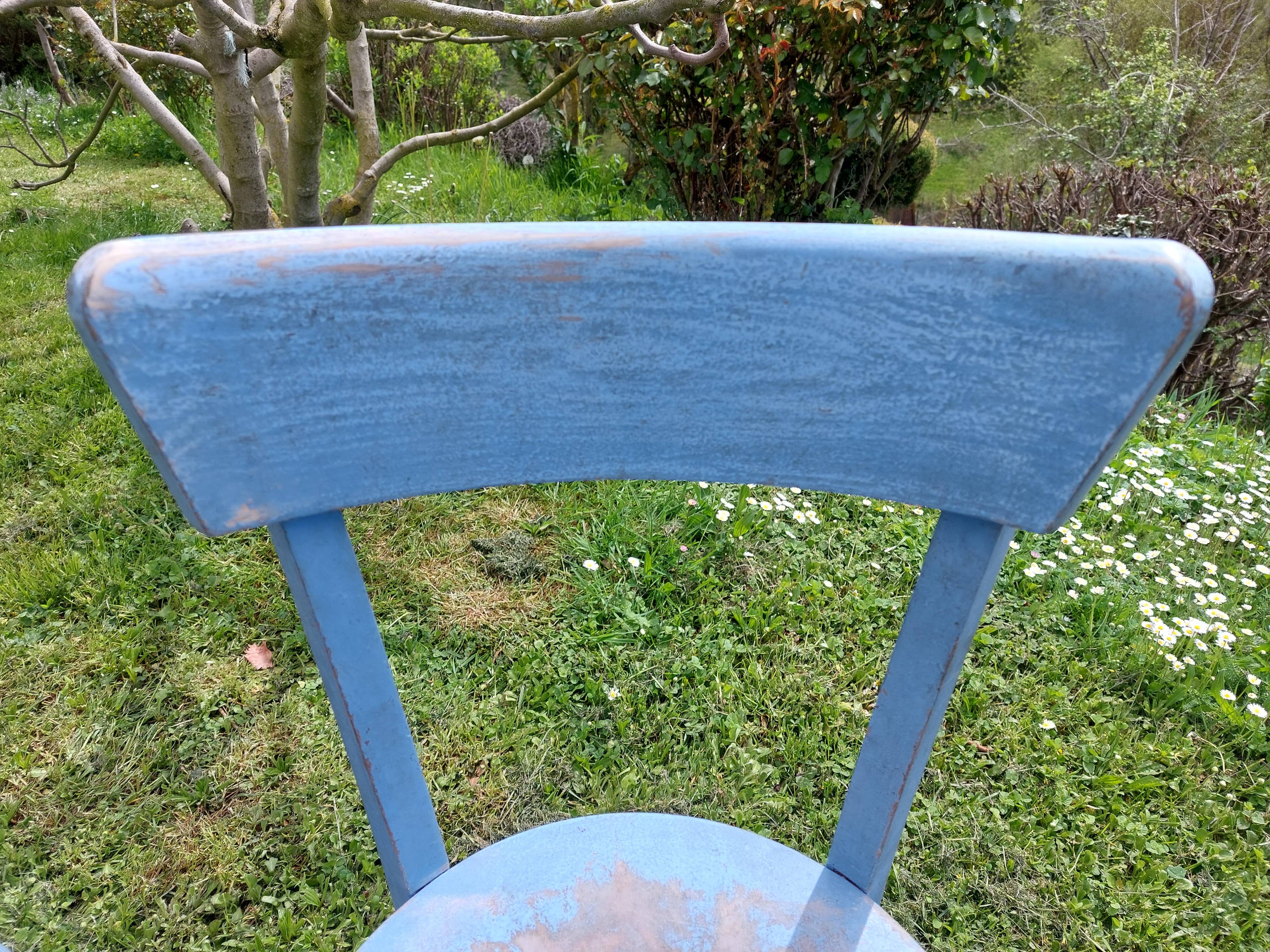 pair of chippy blue paint bistro chairs