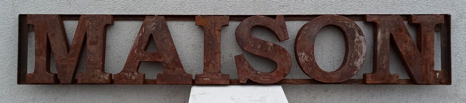 Rusty metal plate HOME