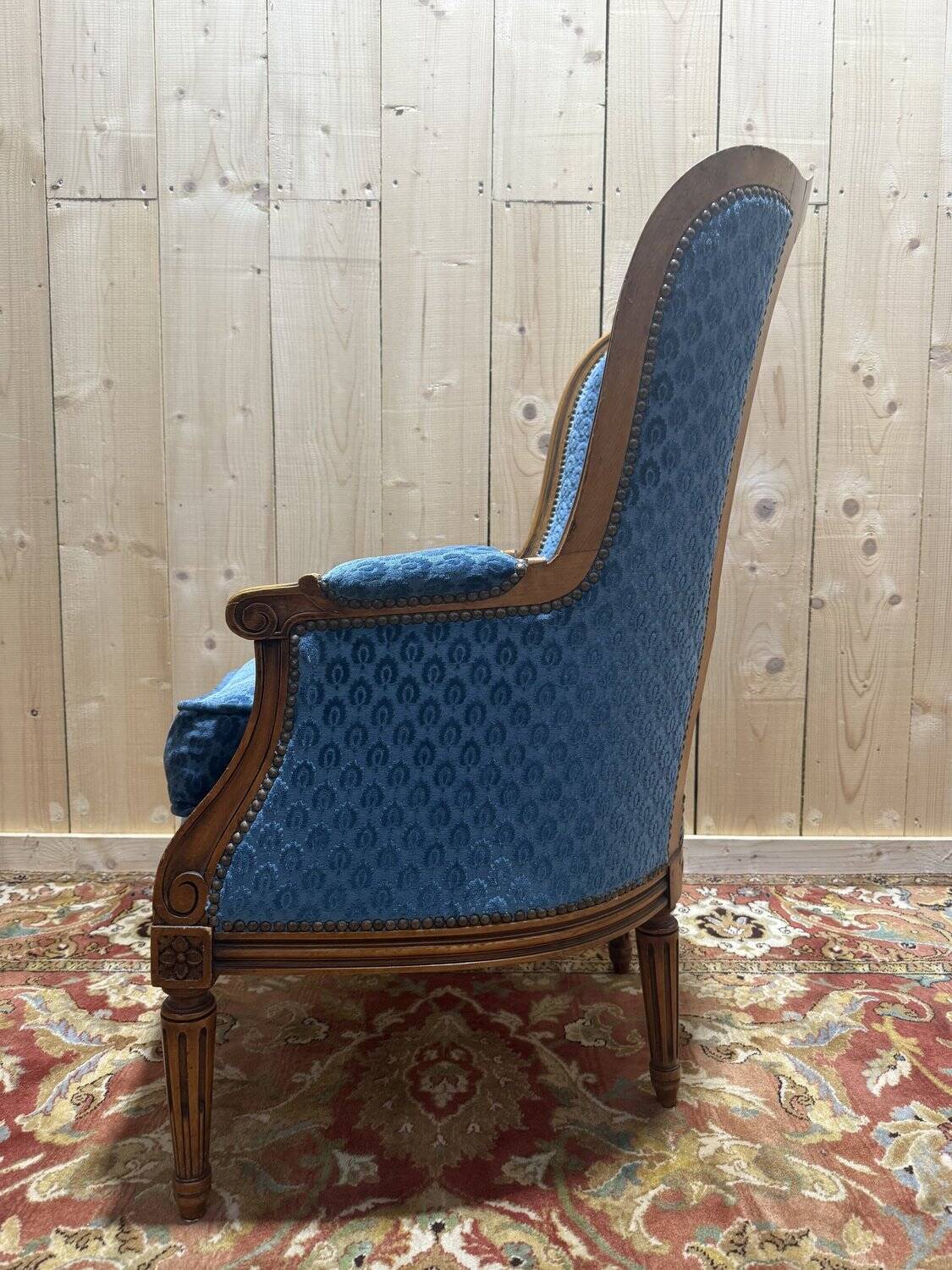 Louis XVI style blue velvet wingback armchair