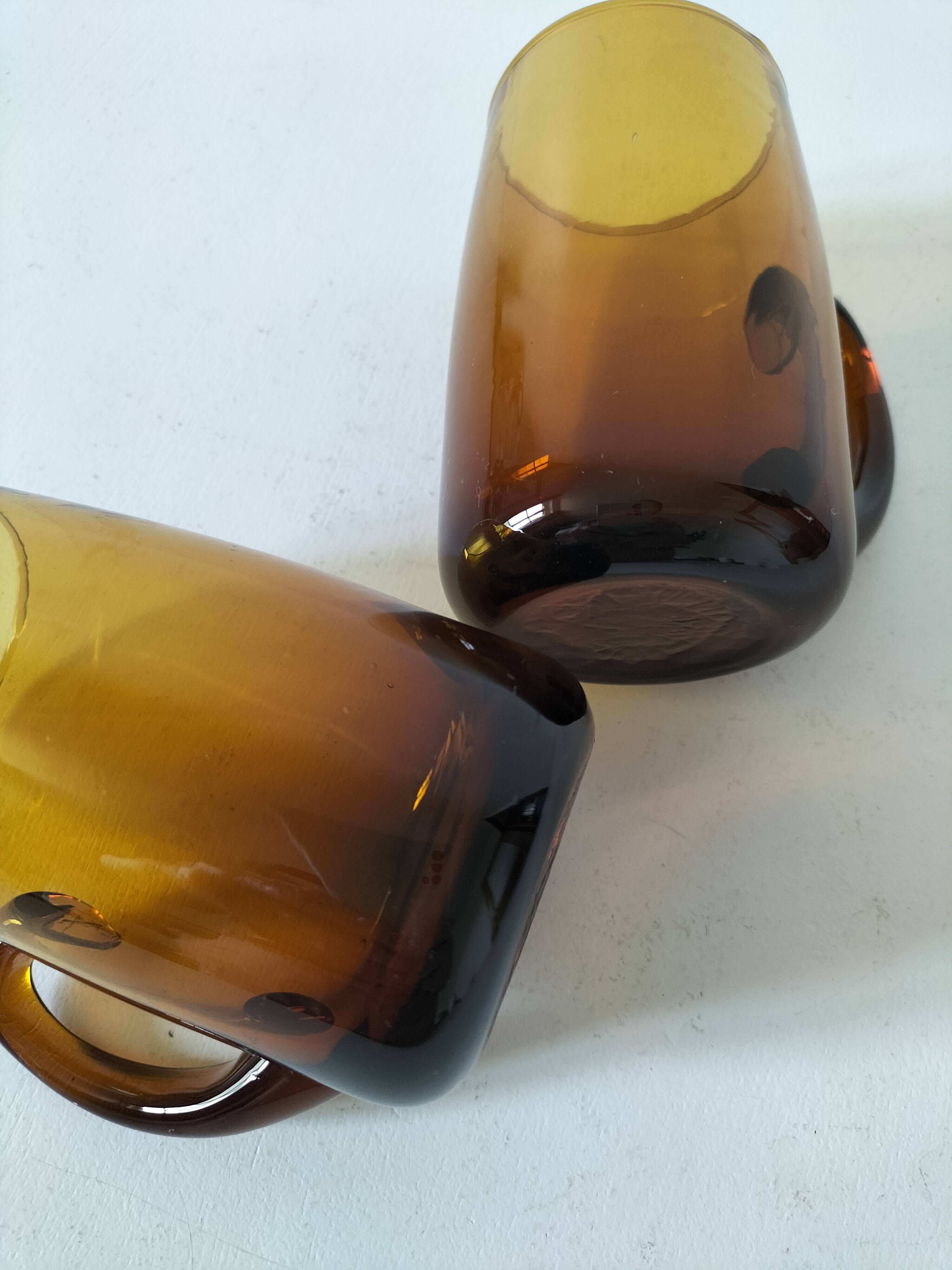 Pair of vintage amber glass tankards