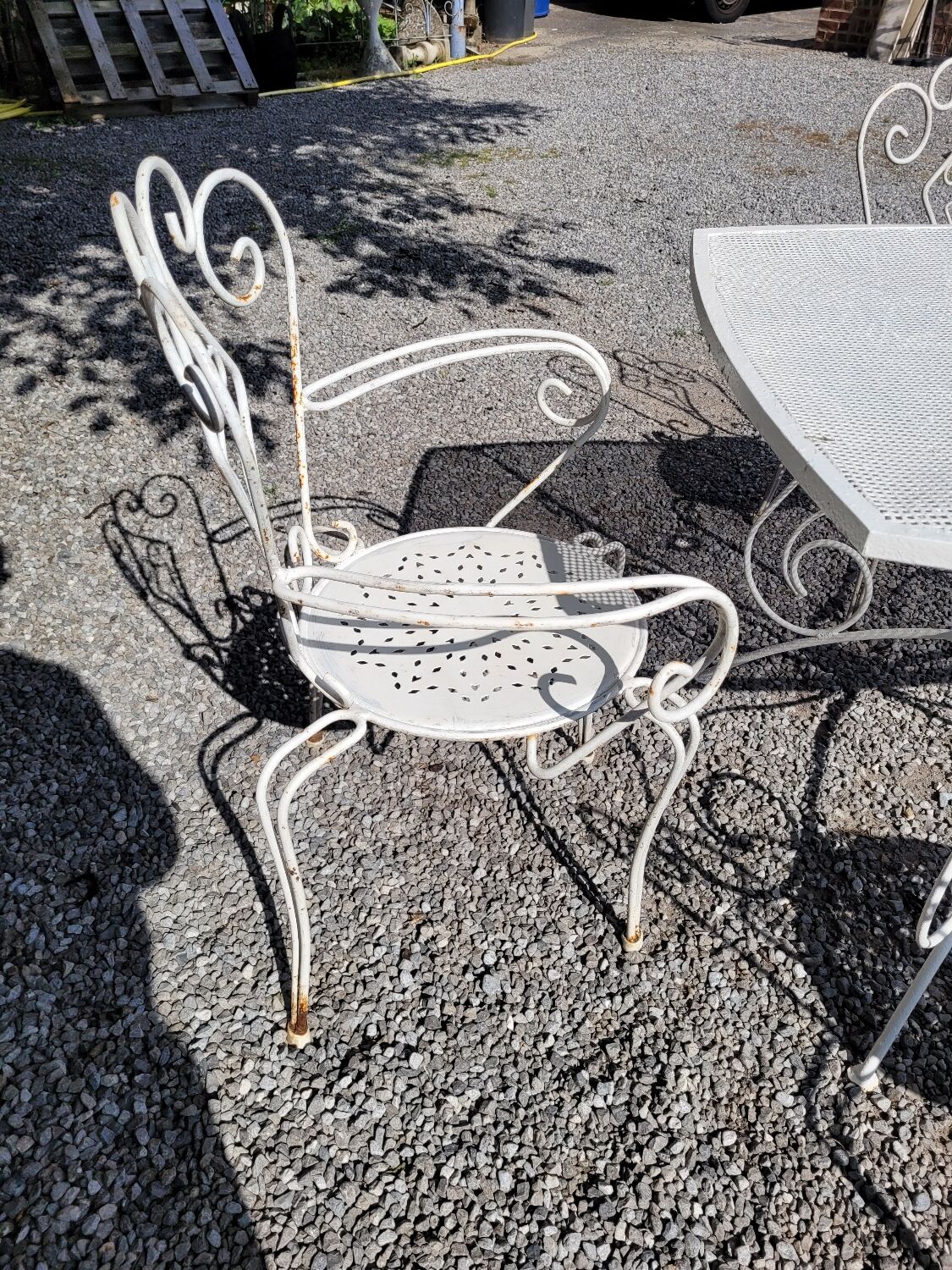 Old wrought iron garden furniture, table + 2 armchairs + 2 chairs