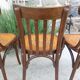 4 bentwood bistro chairs with a pattern on the seat
