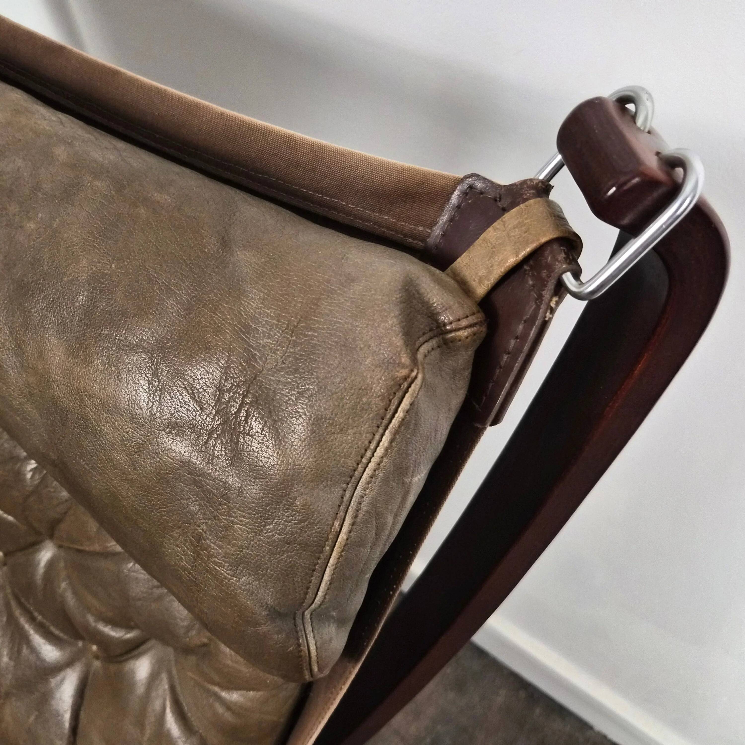 Leather armchair with a beech structure, Falcon model by Sigurd Ressel for Vatne Møbler, Denmark, 1970.