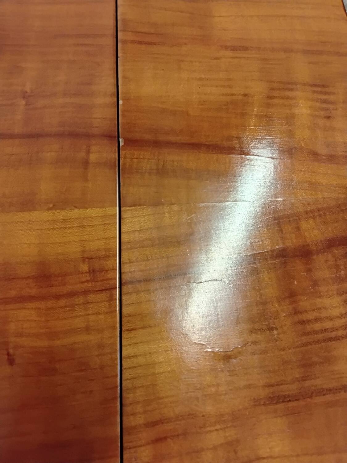 Small wooden drop-leaf table