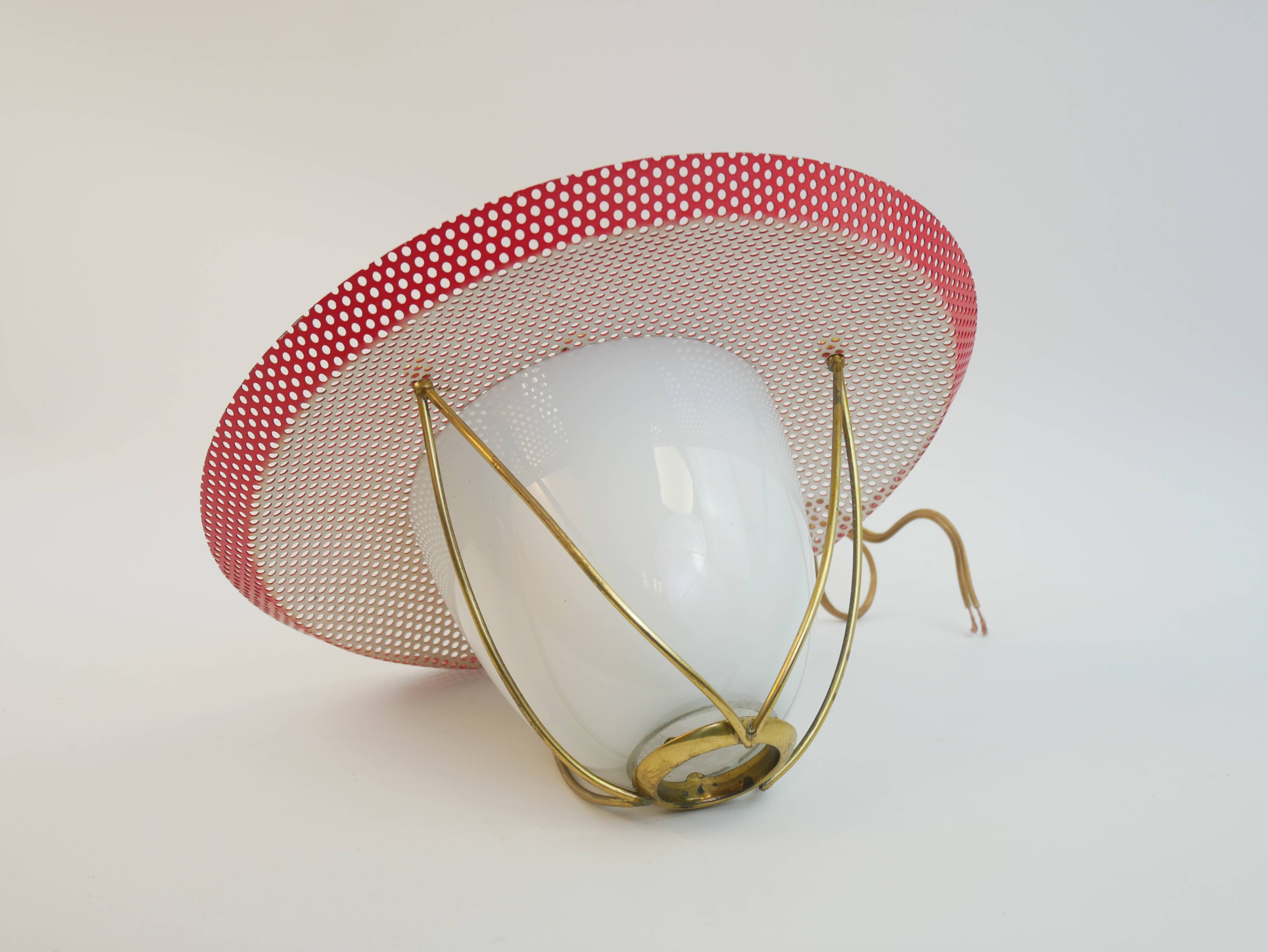 Suspension in perforated red lacquered metal, brass and opaline in the style of Mathieu Matégot