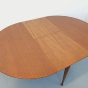 Round dining table in vintage Scandinavian style from the 50s and 60s in teak.