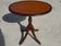 Small side table with an oval top in English style.