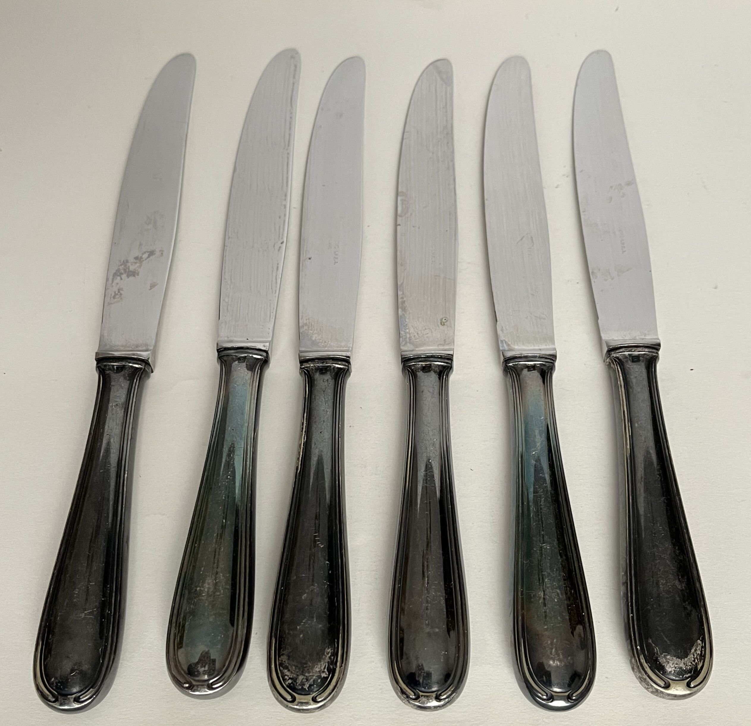 6 silver metal table knives