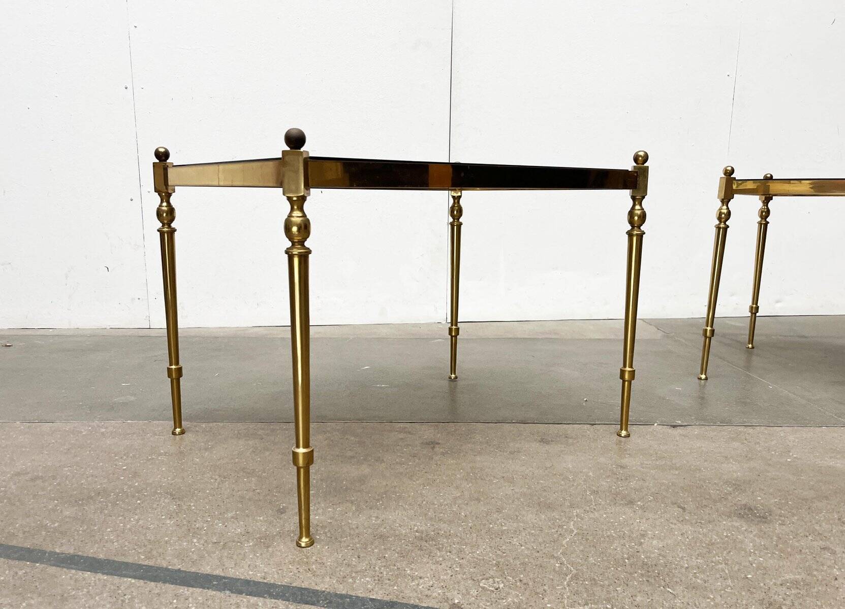 Mid-century Hollywood neoclassical brass and glass side tables or bedside tables from the 1950s, set of 2.