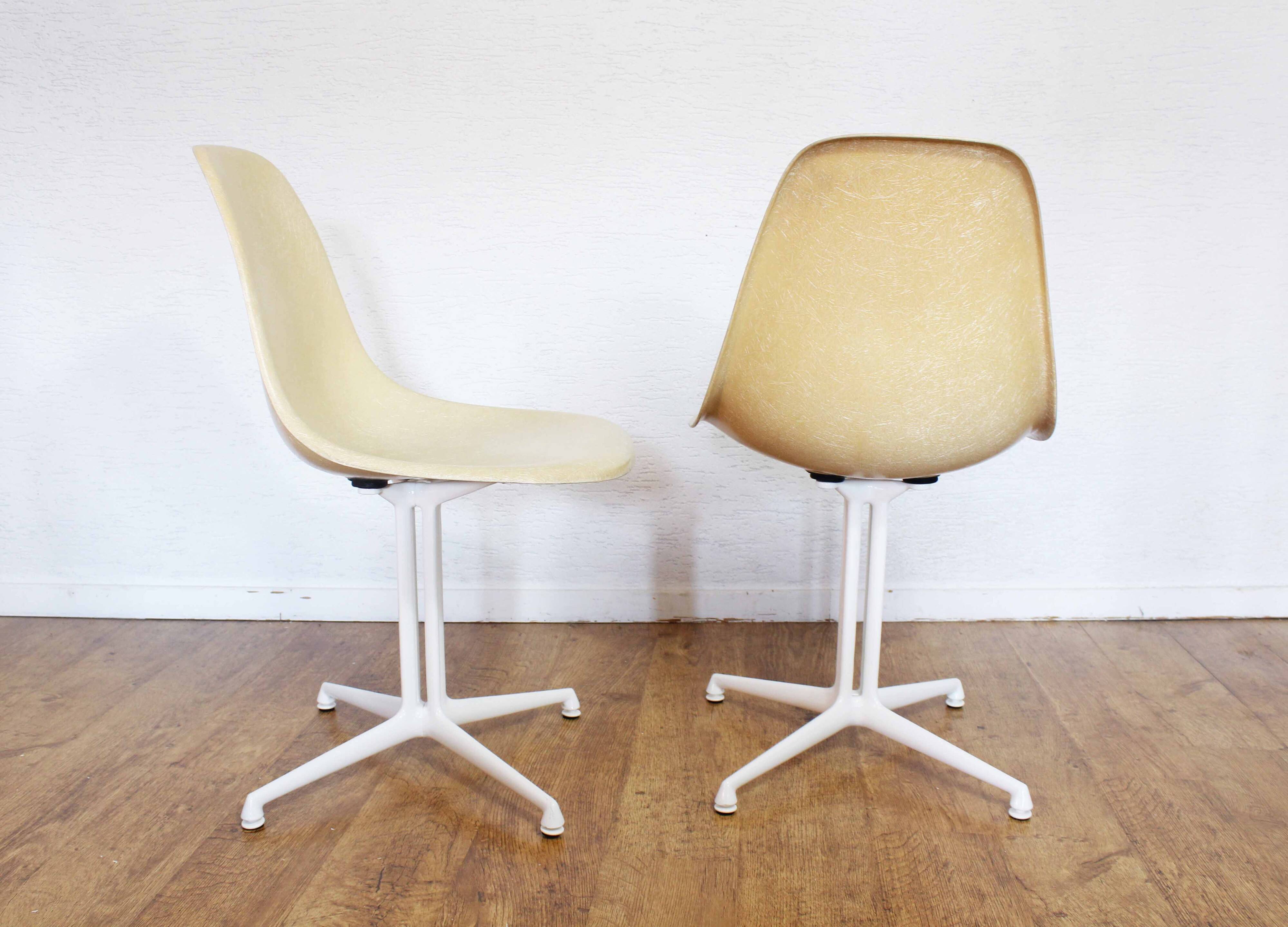 Pair of EAMES La Fonda fiberglass chairs 1970