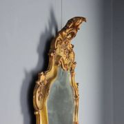 Antique baroque-style mirror in gilded carved wood, Italy 19th century.