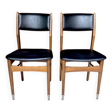 Paire de chaises scandinaves en bois et Skaï noir