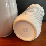 A pair of vintage ceramic vases from the 1970s.